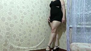 Mature russian milf shows plump legs and big ass under skirt in foot fetish scene with high heels and pedicure