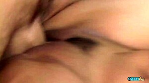 Asian hottie gives her man a titty fucking to make him cum