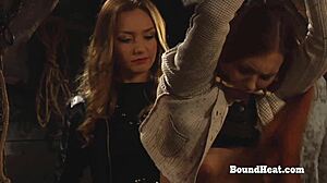 Tight lesbian slave moans under madame's sensual fingering and kisses