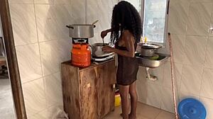 Newly married couple having passionate sex in the kitchen