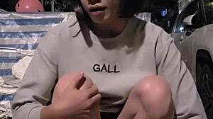 Ting Xuan Pees Outside In The Open