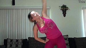 She stretches in pink leggings