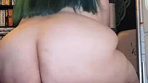 Amateur BBW rides torso, ass shaking, using dildo in homemade scene