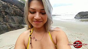 Melody gets cumshot on brazilian beach with friend.