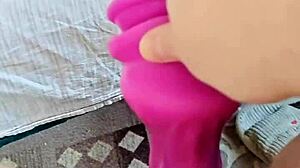 She destroys her hairy pussy with a dragon dildo