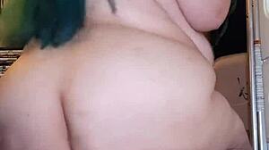 Amateur BBW rides torso, ass shaking, using dildo in homemade scene