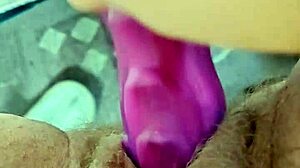 She destroys her hairy pussy with a dragon dildo