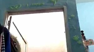 I watch an Indonesian teen girl bathing on webcam, feeling relaxed.