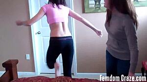 Sarah and cherry gently carrying each other