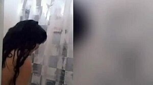 cute latina showering in the bathroom