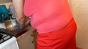 I jerk off to my neighbor in the kitchen while she prepares dinner