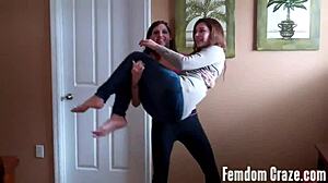 Sarah and cherry gently carrying each other