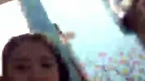 I watch an Indonesian teen girl bathing on webcam, feeling relaxed.