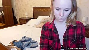 Young Amateur Camgirl Poses in Bra and Shirt