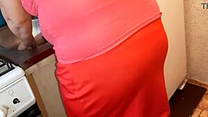 I jerk off to my neighbor in the kitchen while she prepares dinner