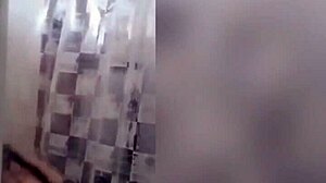 cute latina showering in the bathroom