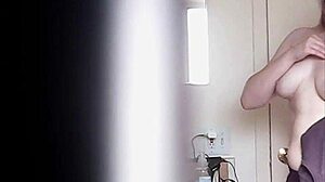 watching this big boobs blonde changing her massive tits