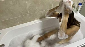 she's singing naked in the bath showing her hairy milf pussy