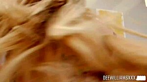 dee williams teases with her busty blonde curves up close