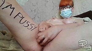 redhead nerd pounds shaved pussy with huge dildo to orgasm