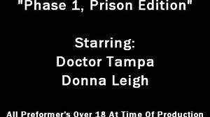 Dr. Tampa Humiliates Redhead Donna Leigh in Prison Handcuffs