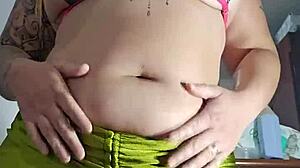 my swollen pussy stretches the tiny bikini during outdoor flashing session