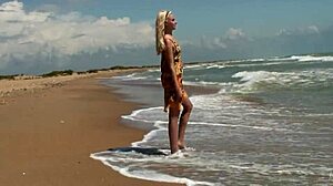 check out this gorgeous teen bathing naked in the ocean waves