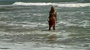 check out this gorgeous teen bathing naked in the ocean waves