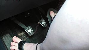 German girl drives car barefoot in flip flops showing sexy naked feet and toes