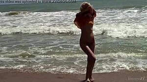 check out this gorgeous teen bathing naked in the ocean waves