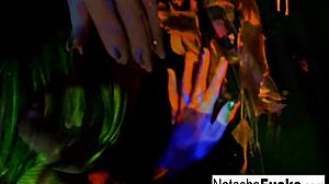 Busty brunette Natasha Nice masturbates sexy in black light