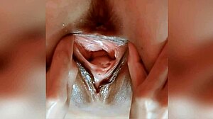 mature milf's huge shaved pussy gapes wide open from extreme hardcore fingering and hand stretching