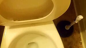 I'm the 21 year old pissing in the toilet penis peeking out