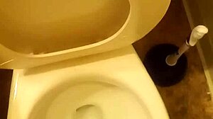 I'm the 21 year old pissing in the toilet penis peeking out