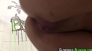 Redhead sucks big black cock through gloryhole for facial