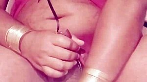 Shemale in sexy dress strokes hard cock wildly