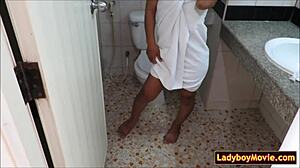 i can't stop shaking as this hairy thai ladyboy strokes her cock in the bathroom mirror