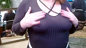 Teasing dirty mouthed dawnskye1962 flashes natural tits in fishnet thigh highs and heels before mirrors