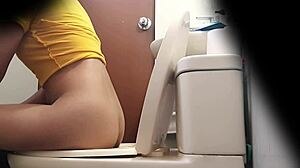 hidden spy cam catches argentinian hermanastra pissing upskirt in miniskirt