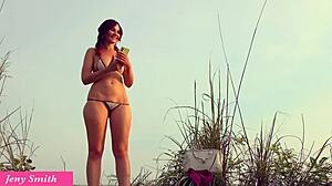 Jeny Smith teases wet pussy publicly on beach
