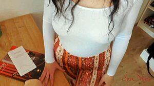 Sex doll consultant bends over showing off her curves