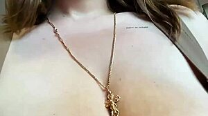 Webcam slut fingers shaved pussy while shaking huge tits