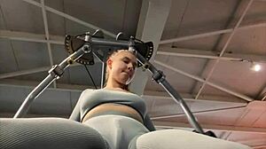 blonde teen shakes with overwhelming pleasure masturbating hard in the gym