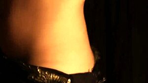 brunette milf poses sexy in her tight black dress