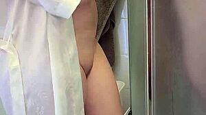 stepmom grabs my big cock in shower helps me jerk off till i cum on her huge tits