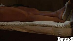 bound busty lesbian slave rubs her big tits in bondage