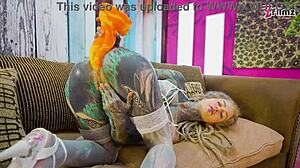 skinny tattoo slut gaps her asshole wide with huge xl dildo in fishnets and heels