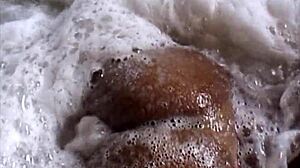 naughty brunette flashes ass tits at bar then strips naked in tub