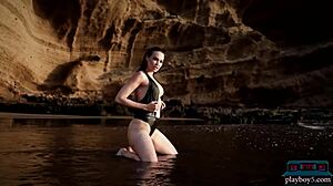 German milf bombshell Jasmin Furry strips furry pussy on beach for Playboy centerfold