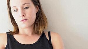 this cute blue-eyed brunette babe smokes teasing her petite voyeur curves slowly